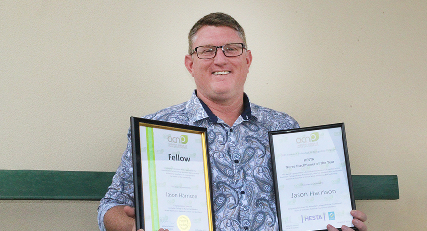 Jason Harrison with his certificates for Nurse Practitioner of the Year at the Australian College of Nurse Practitioners annual conference 