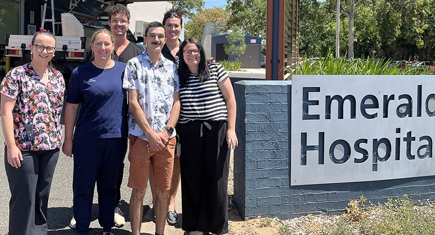 From left: Nurses Anna Talbot and Sarah Dobson, Dr Steve McLaughlin, Kobie Simmonds, nurse Lauren Griffiths and Nurse Navigator Jessica Fromholtz stand at the front of Emerald Hospital