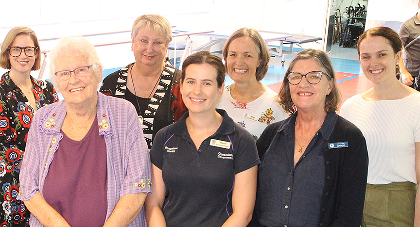 Lyn Thompson with CQ Health staff members